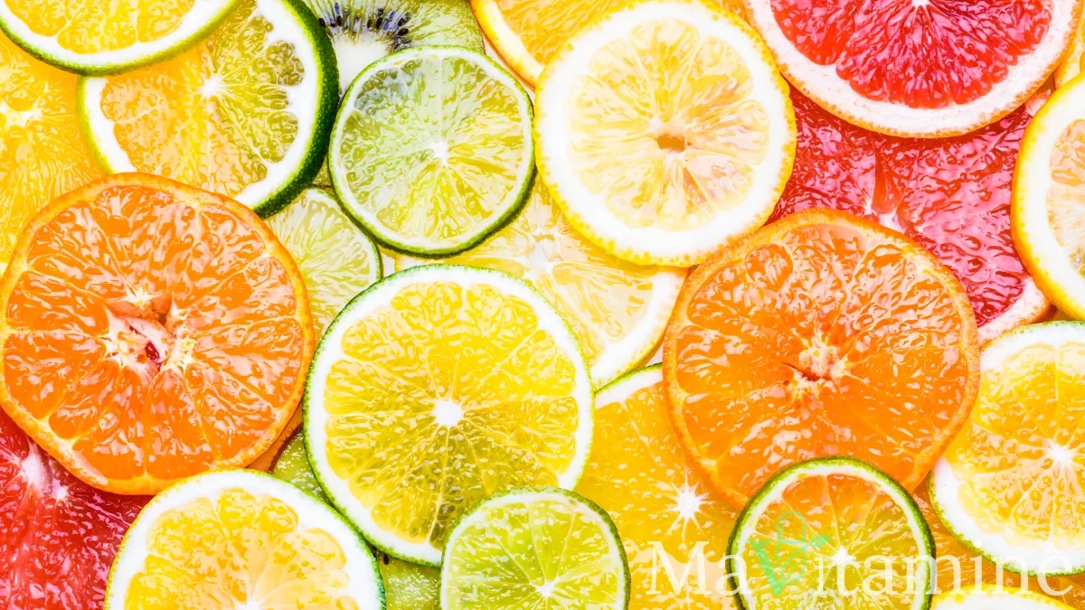 Assortiment de fruits et légumes riches en vitamine C comme les oranges et les poivrons