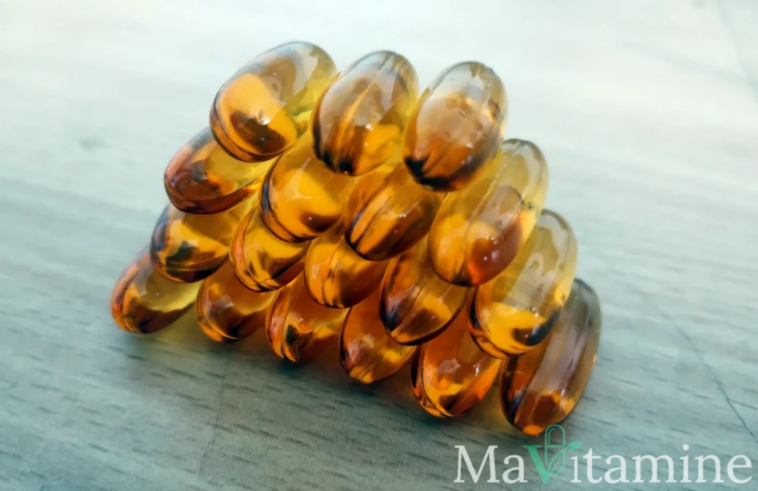 Capsules d’huile de poisson oméga-3 EPA et DHA sur fond blanc